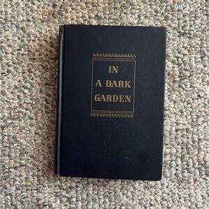 1946- In A Dark Garden Hardcover Book